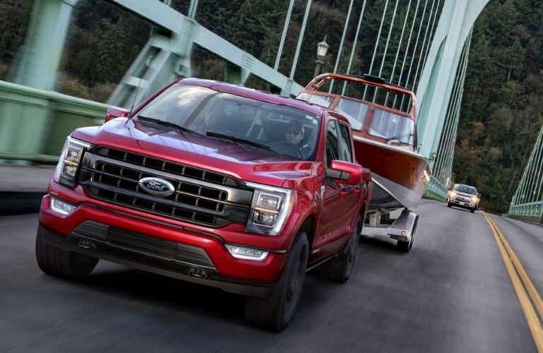 2021_Ford_F-150_driving_on_a_bridge_front_view_o