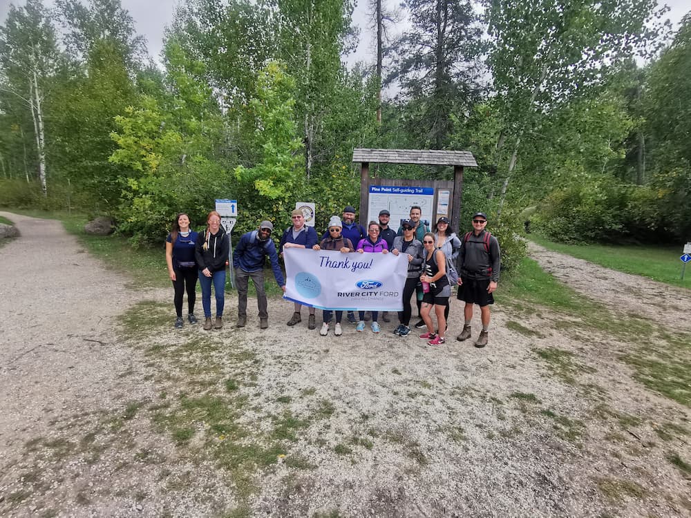 group of people on a trail