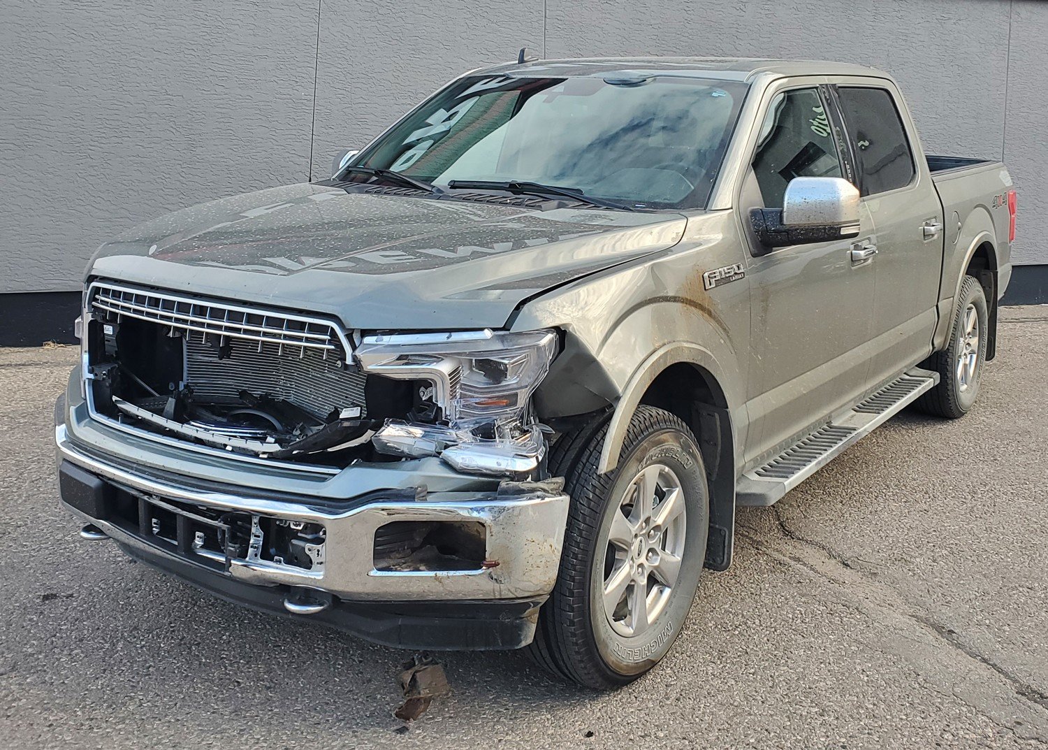 car with dented fender